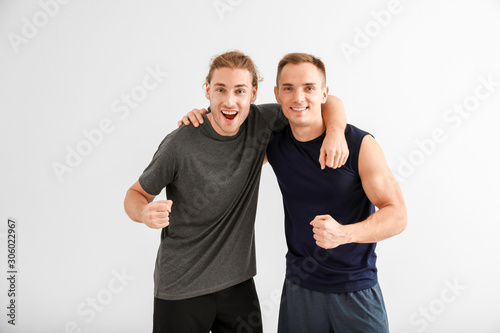 Sporty friends on white background