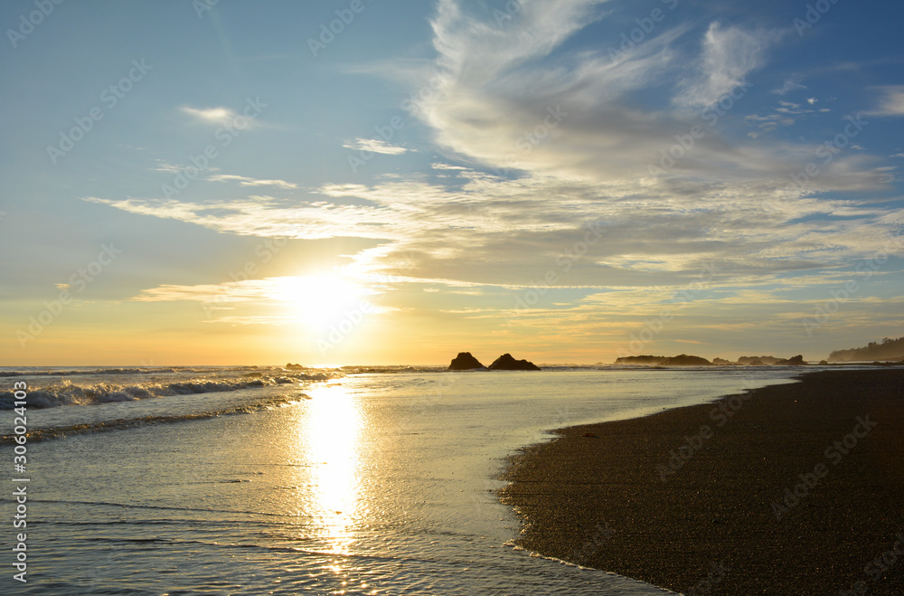 Unique beaches in front of the jungle of the choco, contrast of the mas and the jungle in the middle of the sunset,  bahia solano colombia