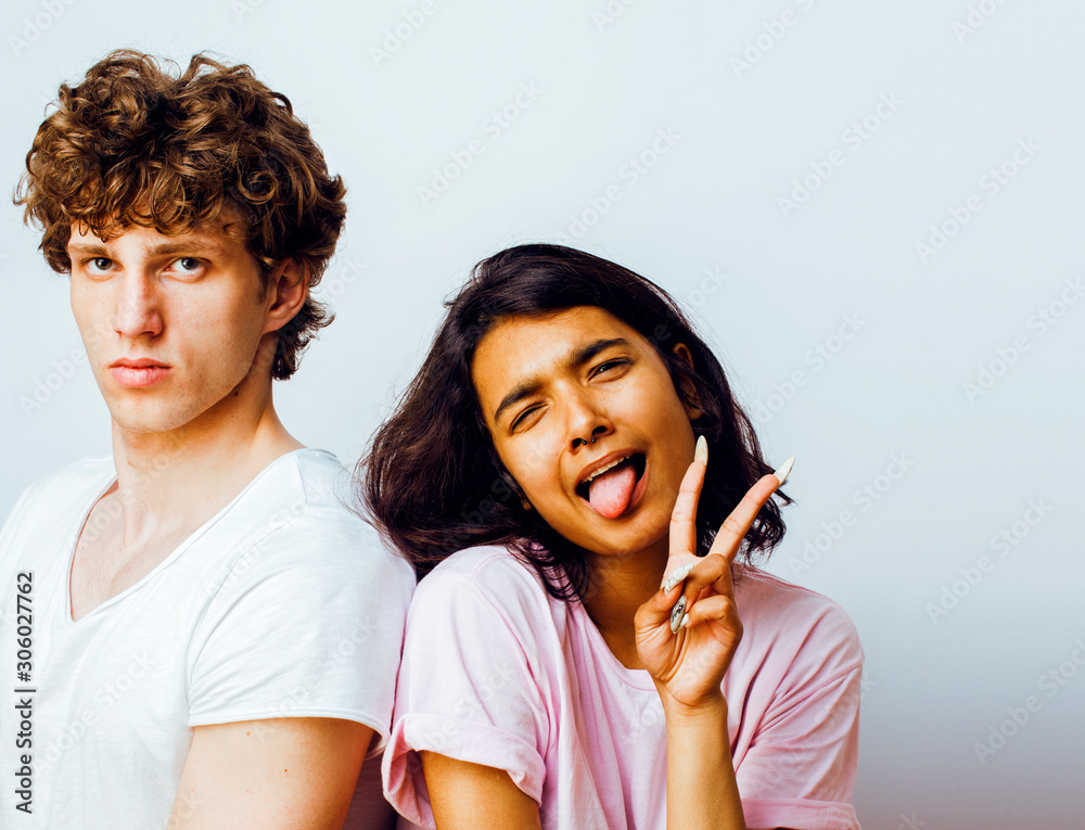 best friends teenage girl and boy together having fun, posing emotional on white background, couple happy smiling, lifestyle people concept, blond and brunette multi nations close up best friends teenage girl and boy together having fun, posing emotional on white background, couple happy smiling, lifestyle people concept, blond and brunette multi nations close up