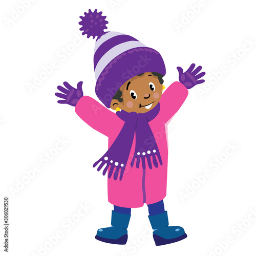 Funny little african girl in winter clothes.
