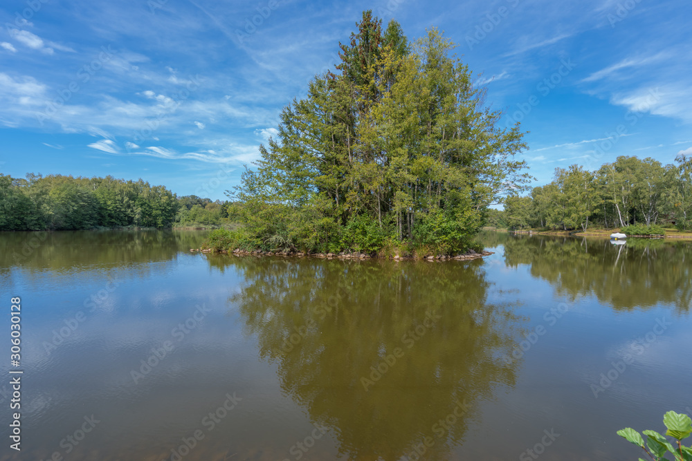 Fototapeta premium Écromagny, France - 10 11 2019: pond Pellevin