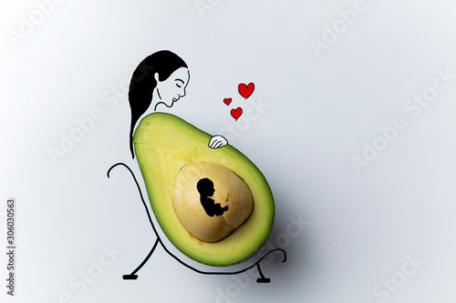 illustration of pregnant woman and avocado photo