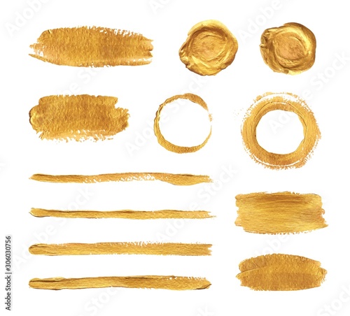Gold paint brush strokes isolated on white background. Set of vector design elements 