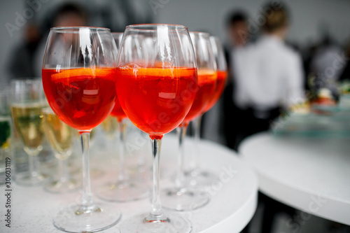 orange aperol in glasses at a banquet © kalinichenkod