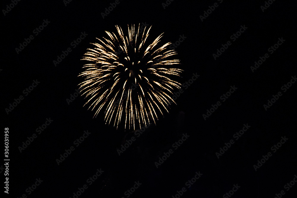 Fireworks in the sky at a fourth of July celebration Fireworks in the sky at a fourth of July celebration