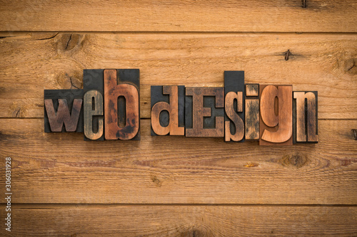 web design, words written with vintage letterpress printing blocks on rustic wood background