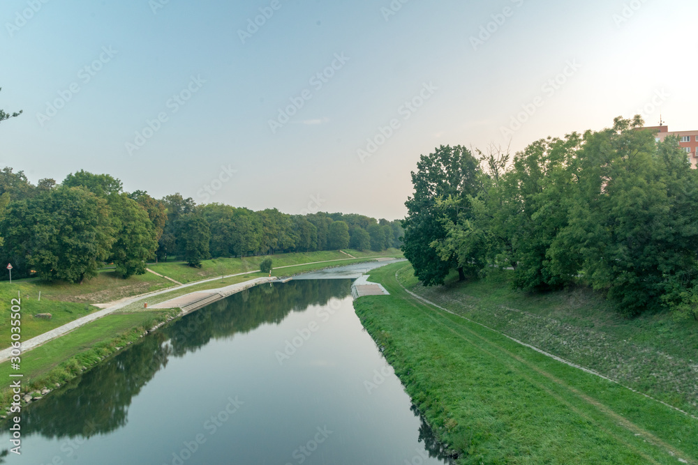 Beautiful sunrise over Ostravice river in Ostrava, Czech Republic.