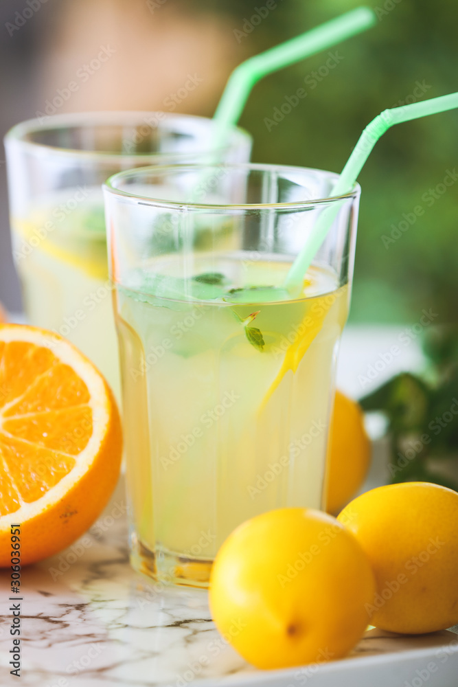 Glasses of fresh lemonade on table Glasses of fresh lemonade on table