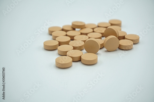Pile of pharmaceutical medicine pills, tablets and capsules. Copy space for text.