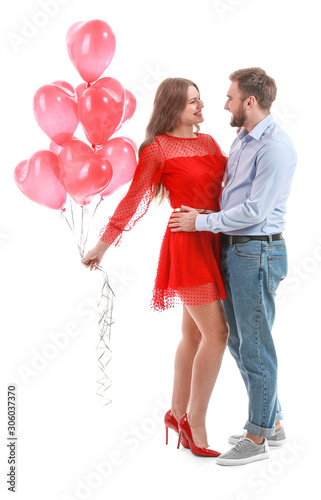 Happy young couple with hea...