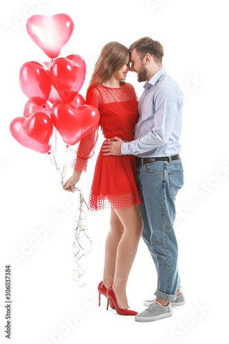Happy young couple with hea...