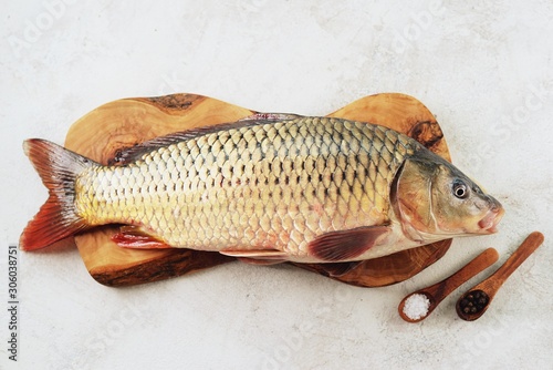 Fototapeta Naklejka Na Ścianę i Meble -  Fresh live raw carp. Fresh river fish. Wild fish. Top view. 