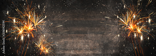 Obraz na plátně Silvester 2022 New Year background panorama long - Firework Fireworks on rustic