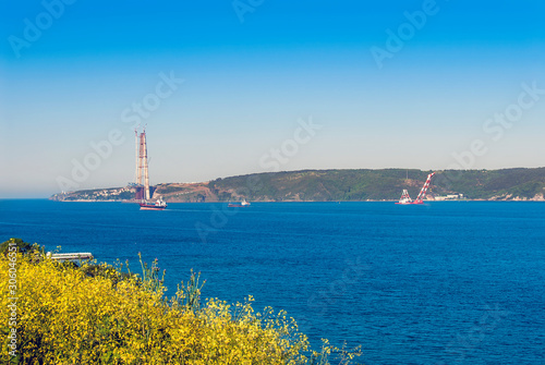 Istanbul, Turkey, 9 May 2015: Yavuz Sultan Selim Bridge, Rumeli Kavagi, Ship at Bosphorus.