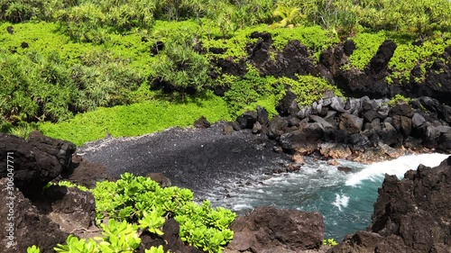 Deserted Tropical Cove With Volcanic Rock