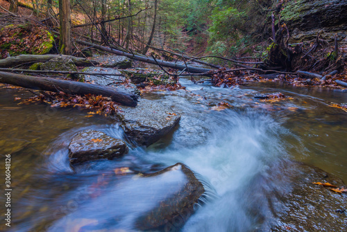 McConnell Mills State park waterfalls in autumn in color  hell's hollow photo