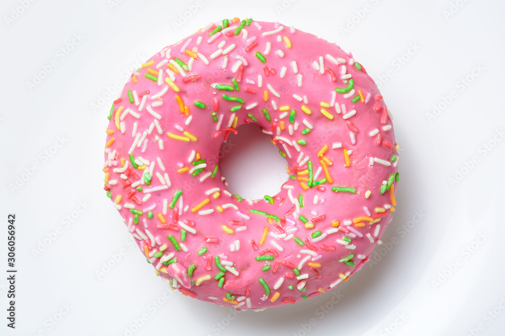 Pink donut on the white background. Close up Pink donut on the white background. Close up
