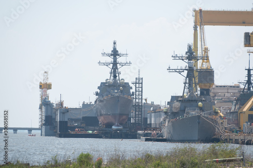 The ship yard of Ingalls Shipbuilding with several military Navy war ships
