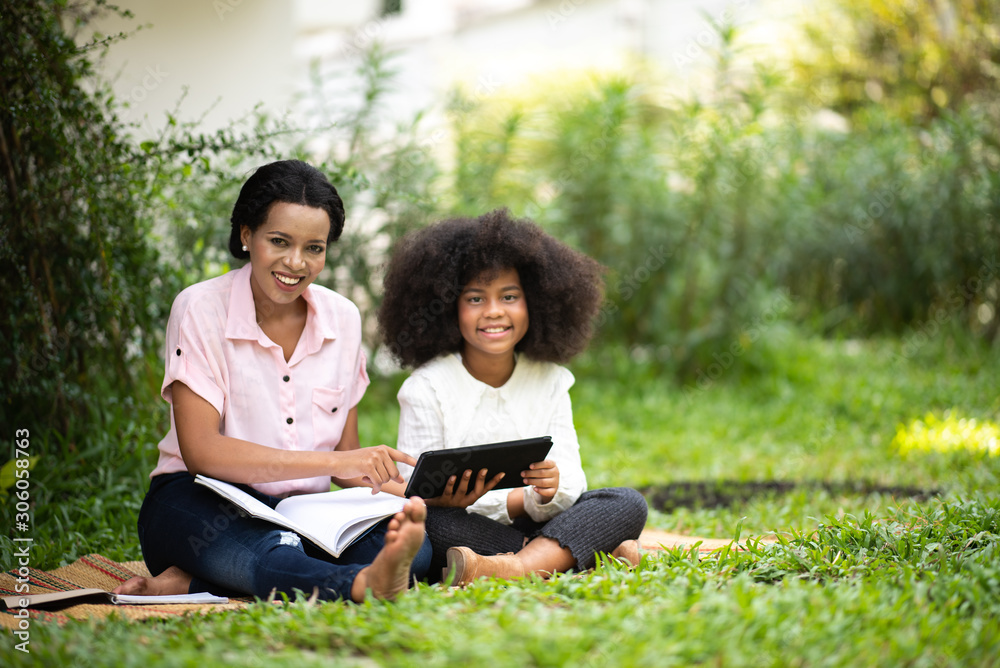 African girls are smiling happily with the family. African girls are smiling happily with the family.