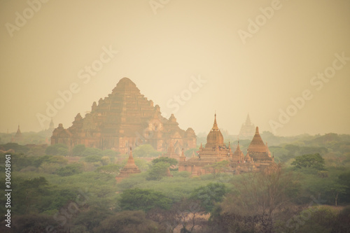 Scenic sunrise with dusty smoke in Bagan Archaeological Zone(Dhammayangyi Temple) in Myanmar. Bagan is an ancient city located in the Mandalay, Myanmar
