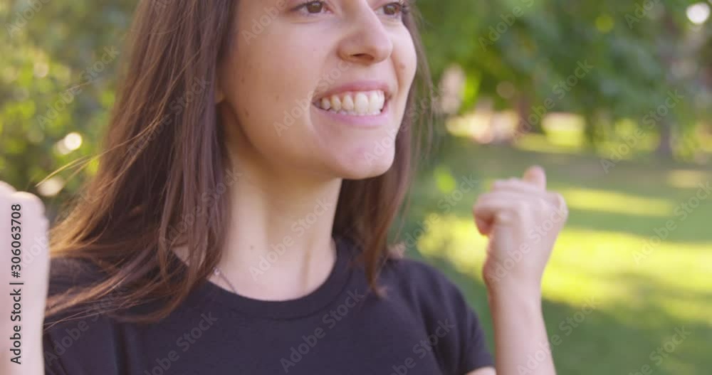 Close up happy woman dancing looking off camera. - Slow Motion - shot on RED Close up happy woman dancing looking off camera. - Slow Motion - shot on RED