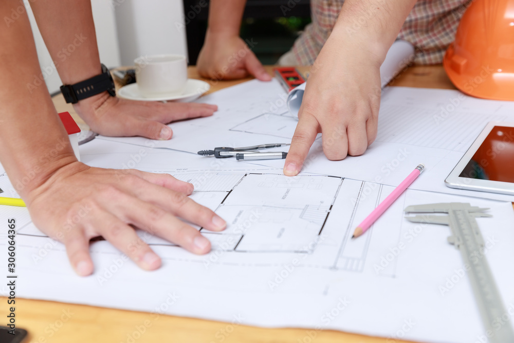 Engineer and Architect concept, Engineer Architects and Interior designer office team working with blueprints Engineer and Architect concept, Engineer Architects and Interior designer office team working with blueprints