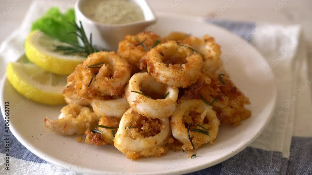 fried squids or octopus (calamari) with sauce fried squids or octopus (calamari) with sauce