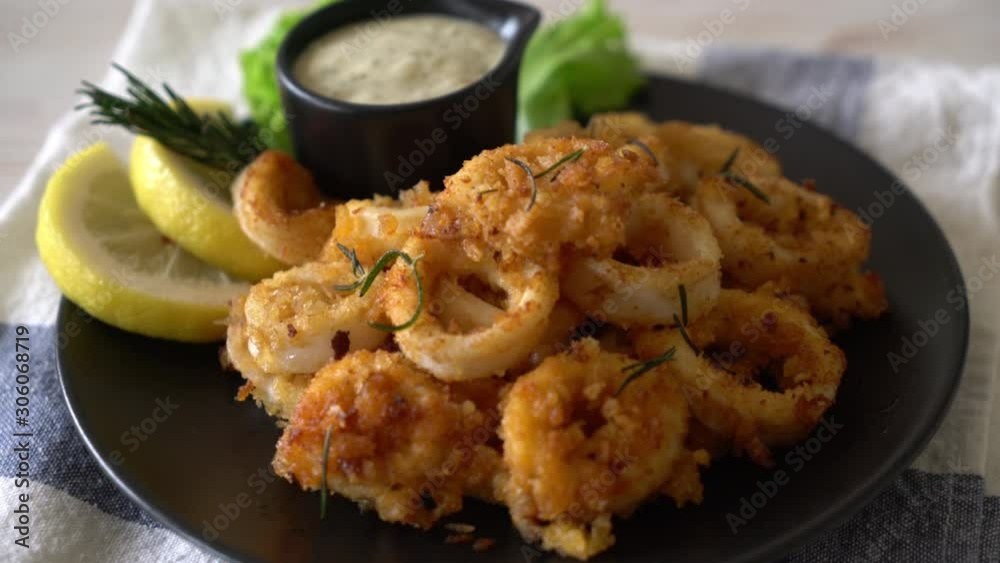 fried squids or octopus (calamari) with sauce fried squids or octopus (calamari) with sauce