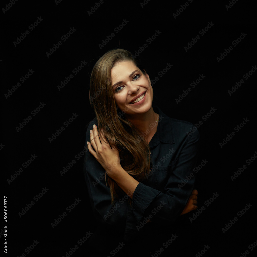 Smiling woman portrait isolated on black