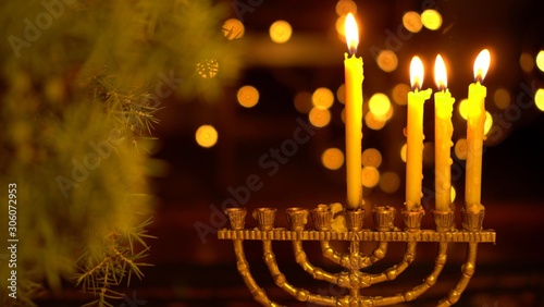 The third Night of Hanukkah. Three lights in the menorah. Chanukah is the Jewish Festival of Lights photo