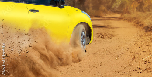 Rally racing car on dirt track. photo