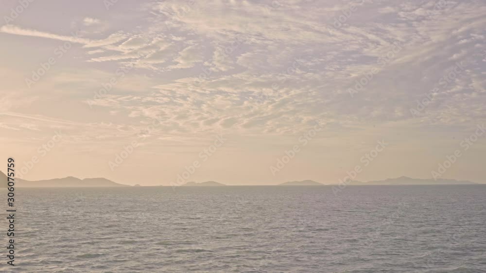 Pale view lonely sunset from the boat with blue ocean in slow motion Pale view lonely sunset from the boat with blue ocean in slow motion