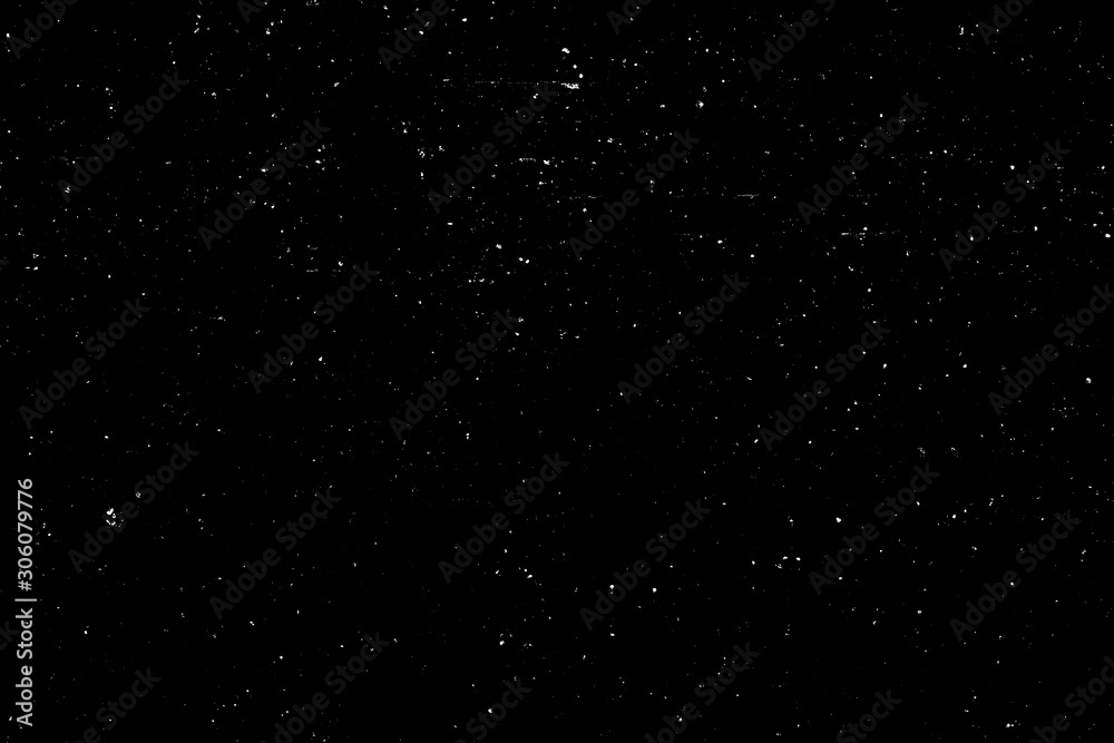 WHITE BOKEH ON A BLACK BACKGROUND. LIGHT SPOTS TEXTURE. FALLING SNOW. STAR SKY.