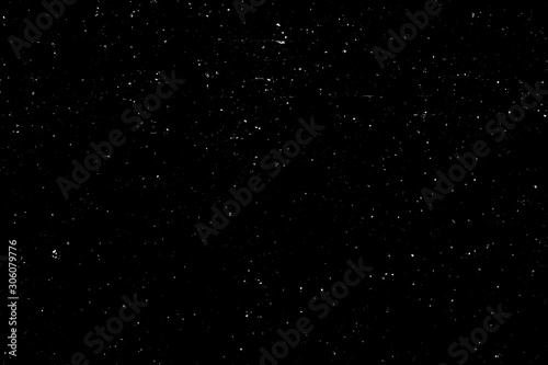 WHITE BOKEH ON A BLACK BACKGROUND. LIGHT SPOTS TEXTURE. FALLING SNOW. STAR SKY. © Илья Подопригоров