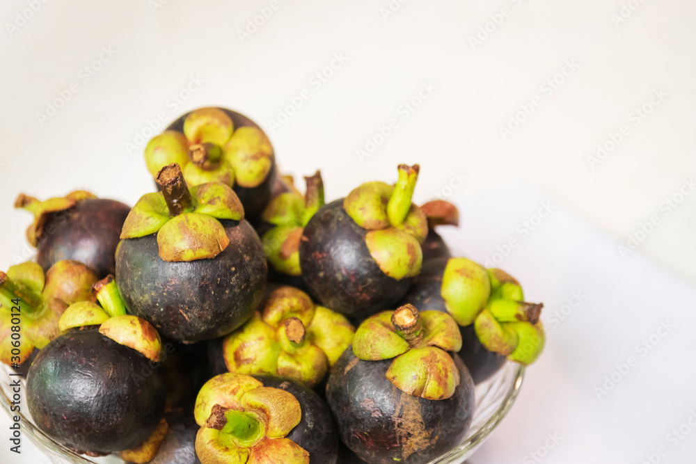 The purple mangosteen (Garcinia mangostana), known as the queen of
