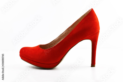 Side view of single elegant red synthetic suede leather high heel woman shoe isolated on white background