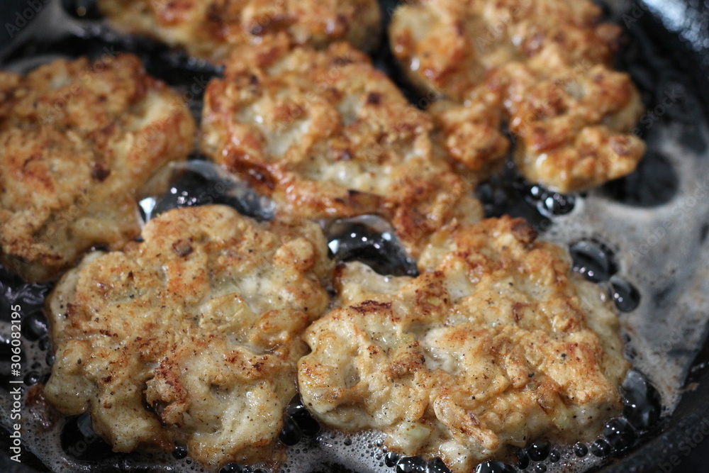 chopped cutlets fried in a pan chopped cutlets fried in a pan