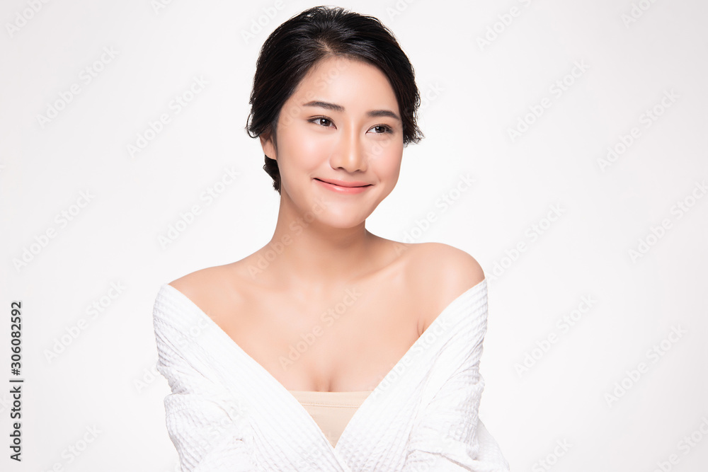 Beautiful Young Asian Woman with Clean Fresh Skin. Face care, Facial treatment, on white background, Beauty and Cosmetics Concept. Beautiful Young Asian Woman with Clean Fresh Skin. Face care, Facial treatment, on white background, Beauty and Cosmetics Concept.