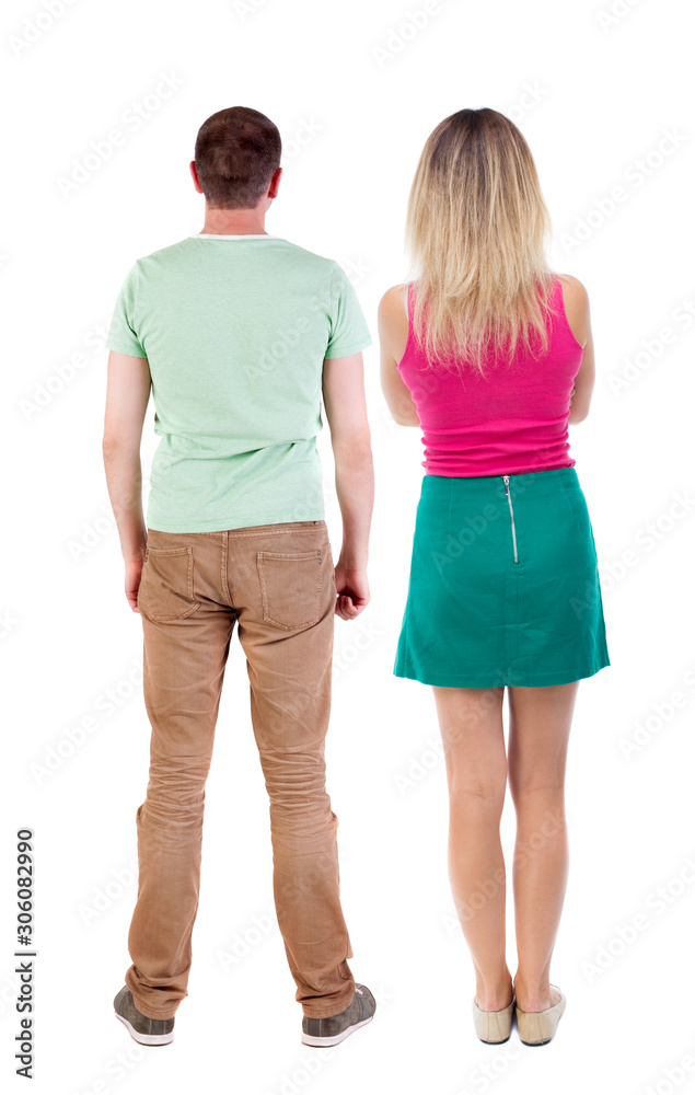 Back view of couple. beautiful friendly girl and guy together. Back view of couple. beautiful friendly girl and guy together.
