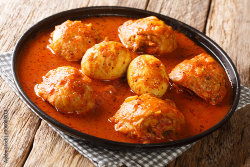 Cuadro en lienzo Doro Wat Ethiopian Chicken Stew slowly simmered in a blend of robust spices close-up in a plate
