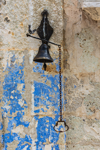 Blue wall, bell and rooster figure, Fokai, Foca photo