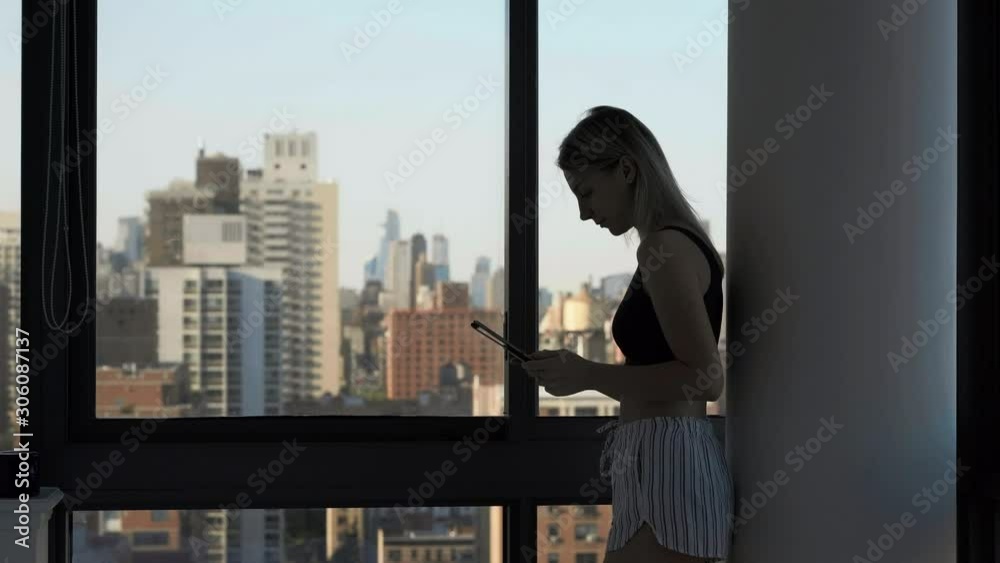 Young female blogger using touch pad for installing new application for editing media files and publicate to social networks, Caucasian woman checking email and writing text answer for sending Young female blogger using touch pad for installing new application for editing media files and publicate to social networks, Caucasian woman checking email and writing text answer for sending