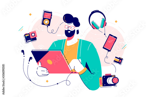 Male character surrounded with gadgets flat design concept photo