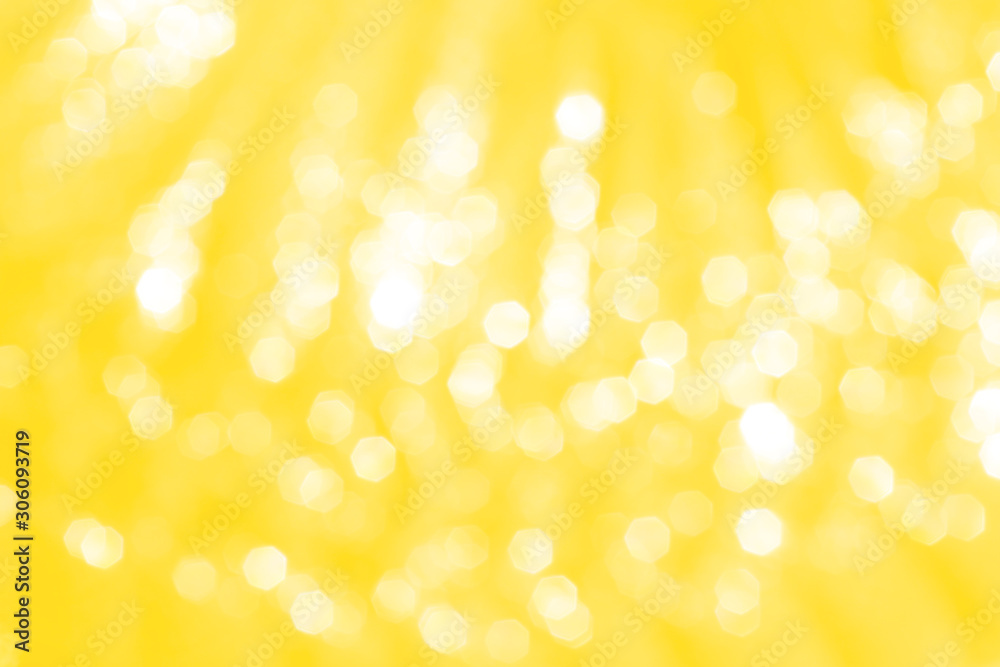 Yellow or gold sparkle glitter abstract bokeh patterns on background Yellow or gold sparkle glitter abstract bokeh patterns on background