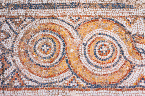 Turkey, Aegean region, Izmir province. Ruins of ancient Greek city Ephesus (Efes). Antique mosaic on floor, destroyed buildings. Detail of geometric mosaic. Famous open-air museum.