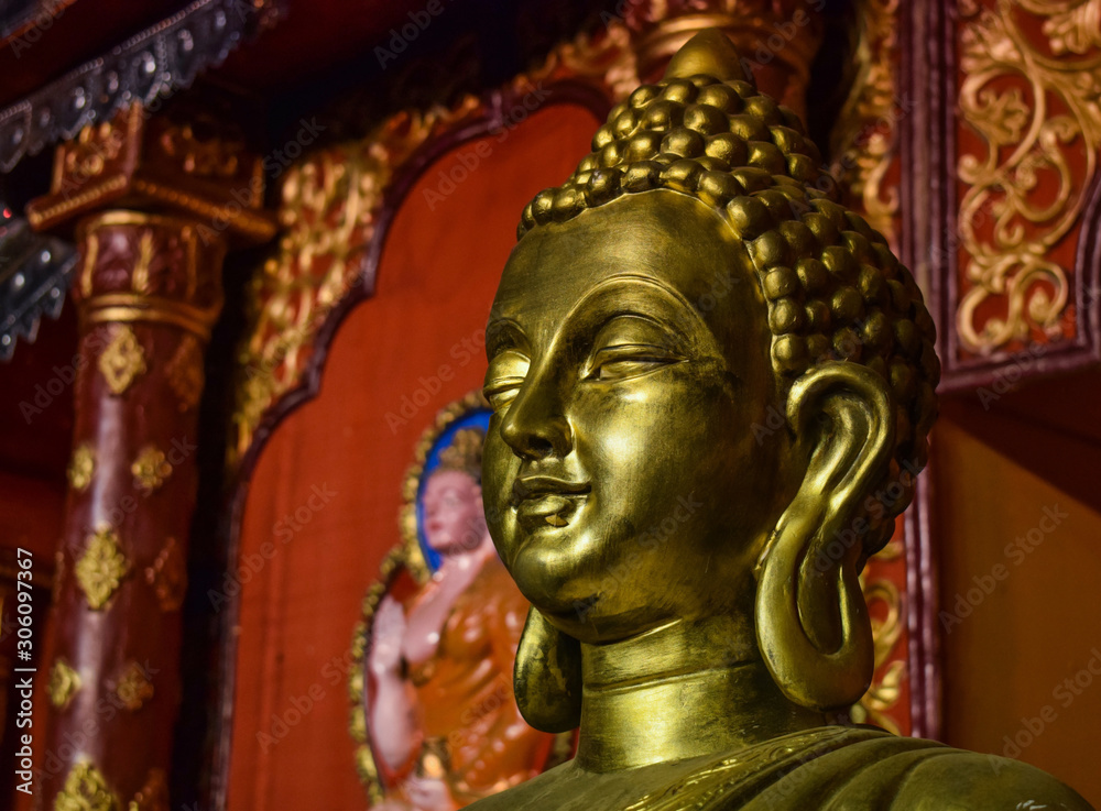 Face of a golden buddha statue