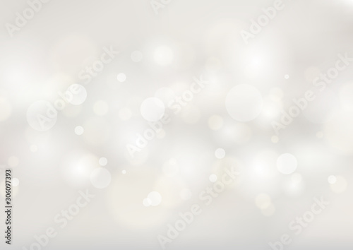 Abstract soft white blurred background with bokeh lights.