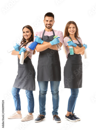 Team of janitors on white b...