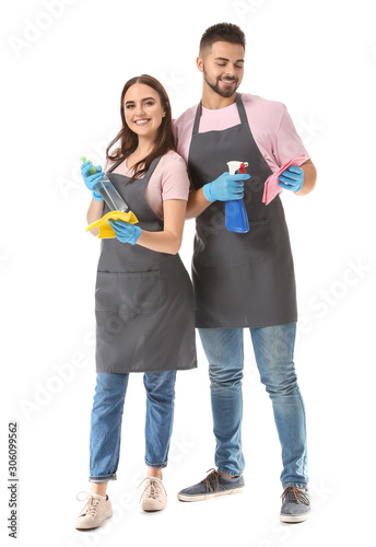 Team of janitors on white b...