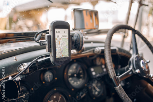 Old classic retro car with gps navigation system